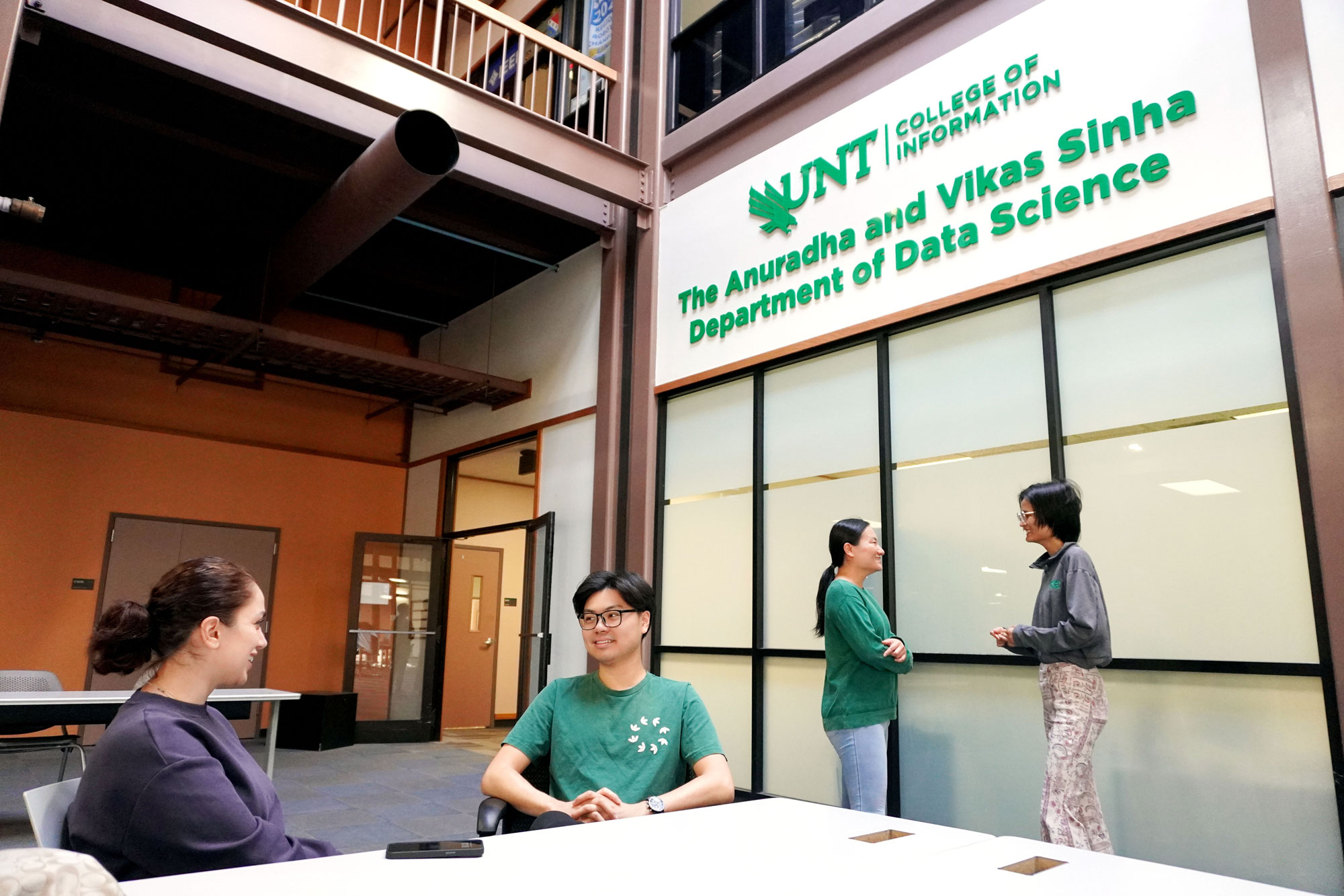 Students meet in front the of the Anuradha and Vikas Sinha Department of Data Science